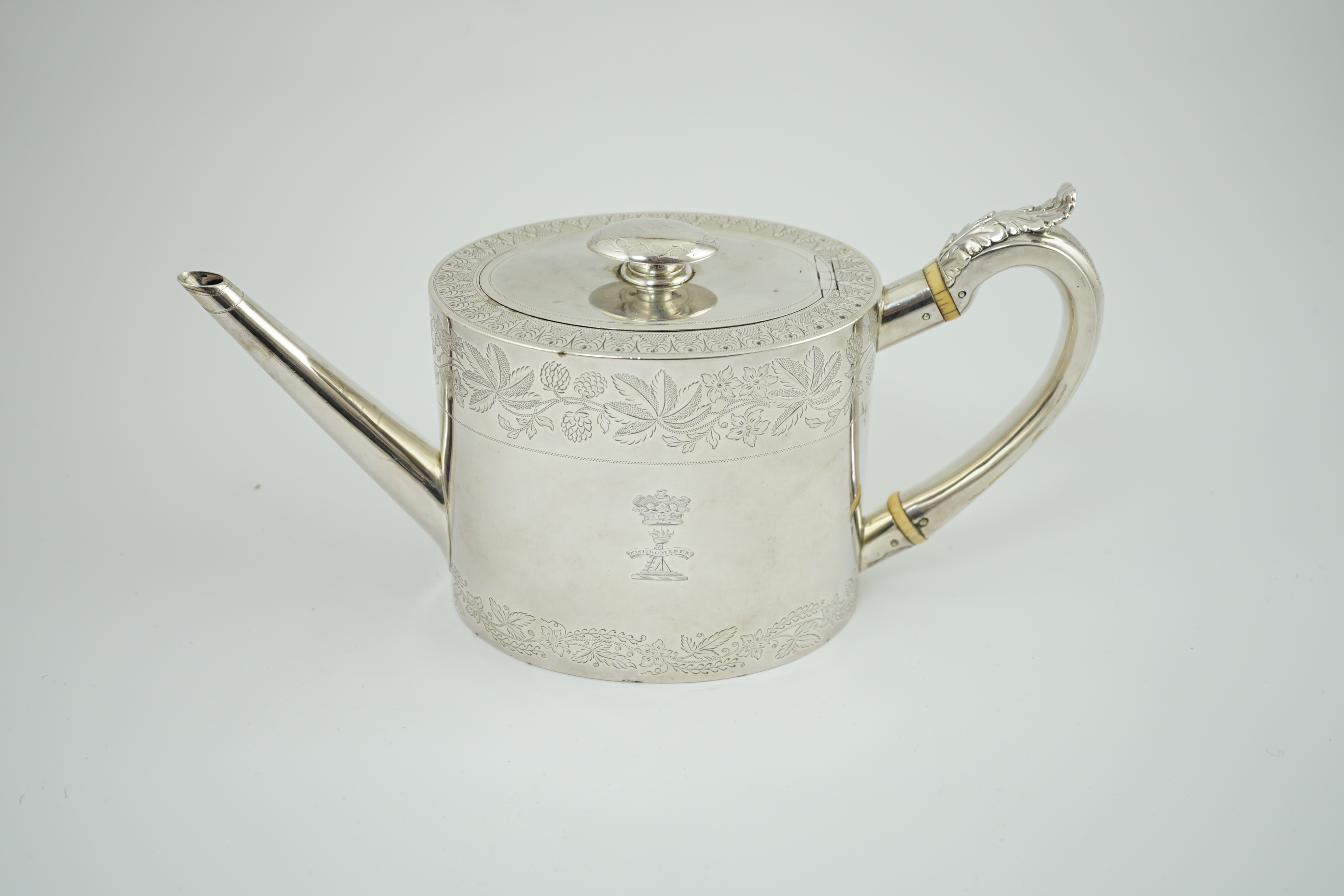 A George IV silver oval teapot by Eames & Barnard, engraved with Coat of Arms of the Duke of Bedford and Earl Compton